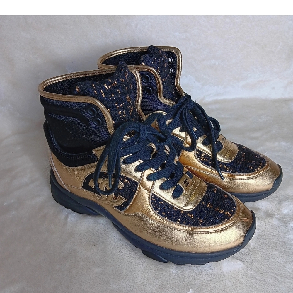 CHANEL Gold and Black High-Top Sneakers